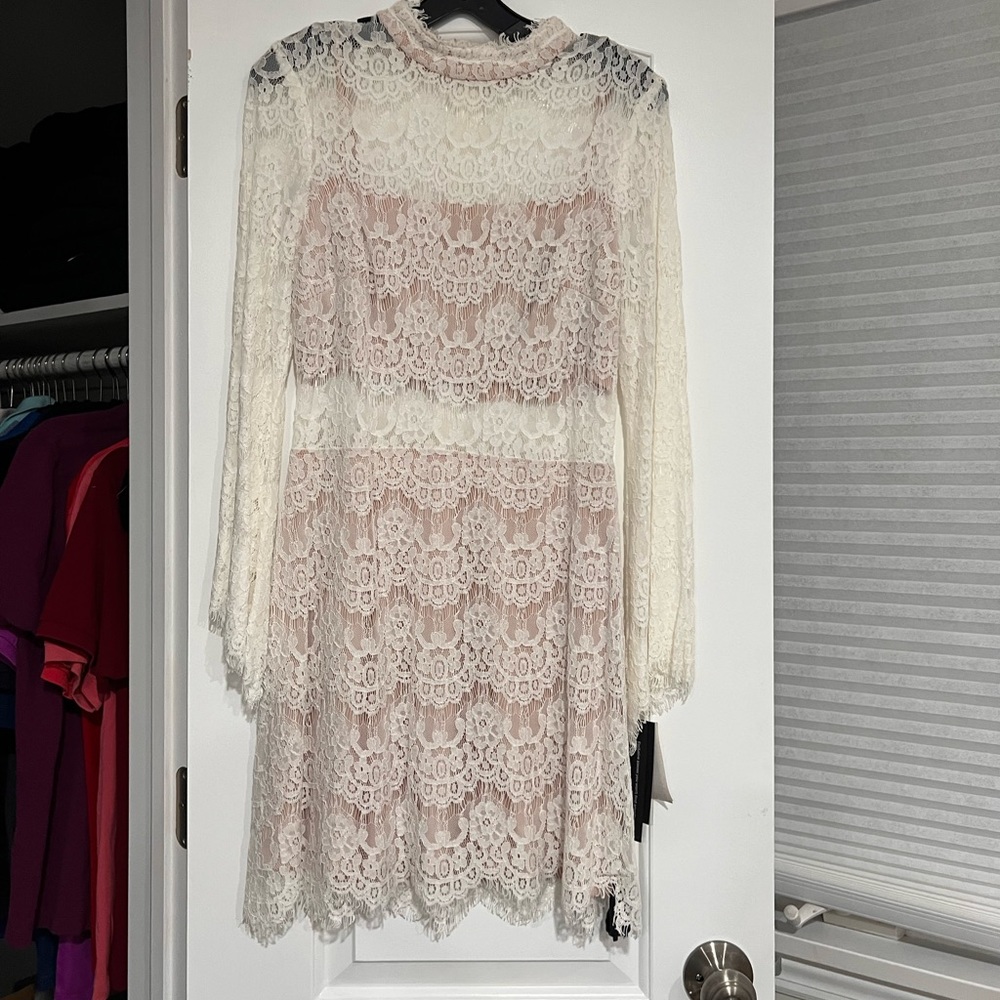 Aqua lace white dress, never warn. New with tags
